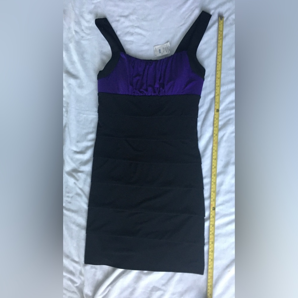 Purple/black short bodycon dress.